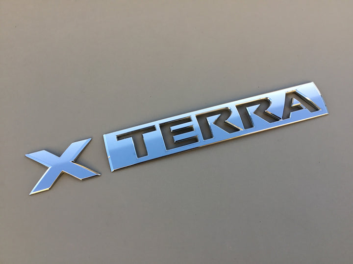 2005-2012 Nissan Xterra Tailgate Emblem