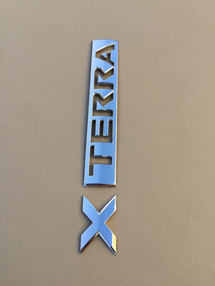 2005-2012 Nissan Xterra Tailgate Emblem