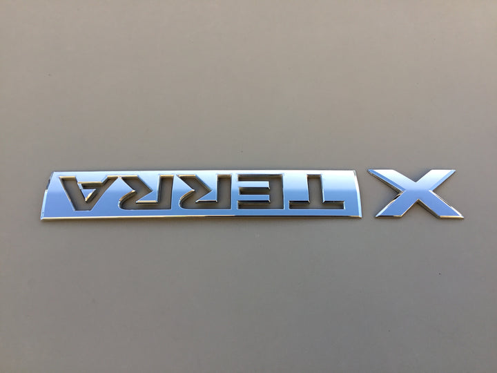 2005-2012 Nissan Xterra Tailgate Emblem