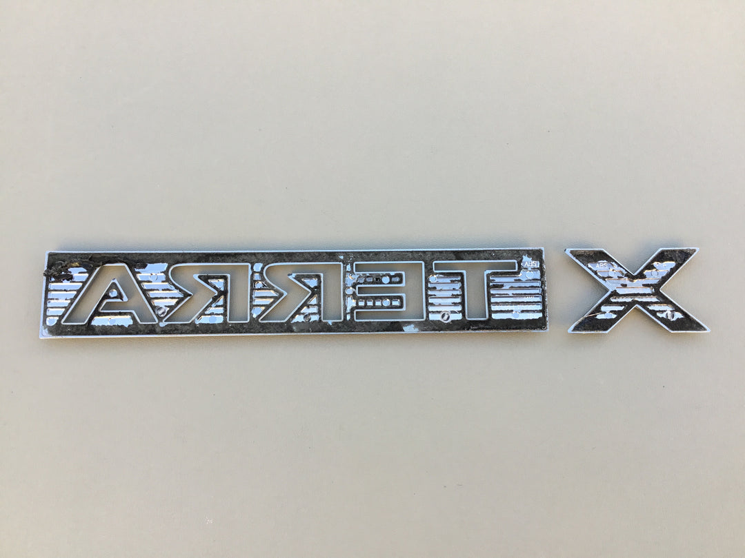 2005-2012 Nissan Xterra Tailgate Emblem