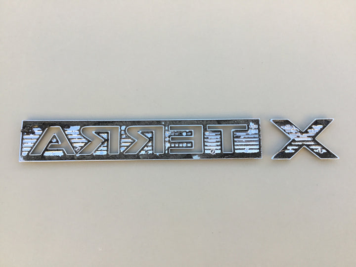2005-2012 Nissan Xterra Tailgate Emblem