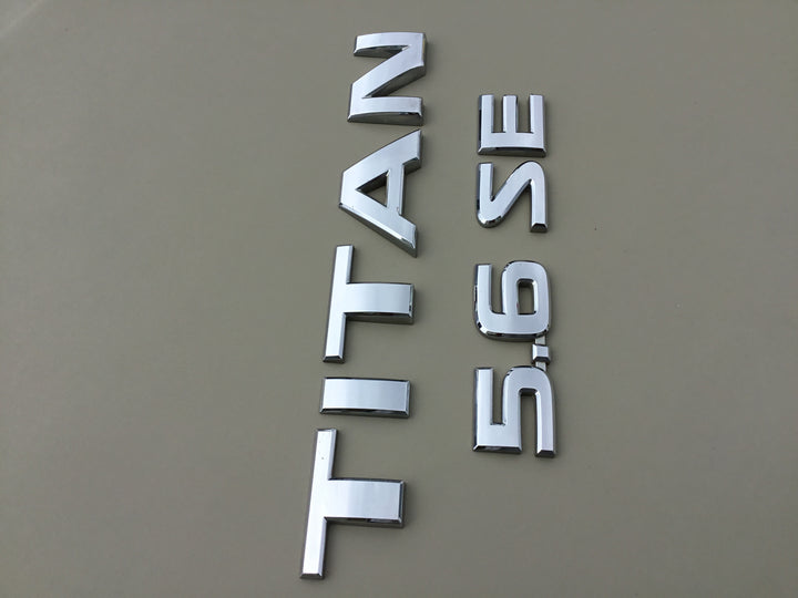 2004-2012 Nissan Titan 5.6 SE Tailgate Emblem Set