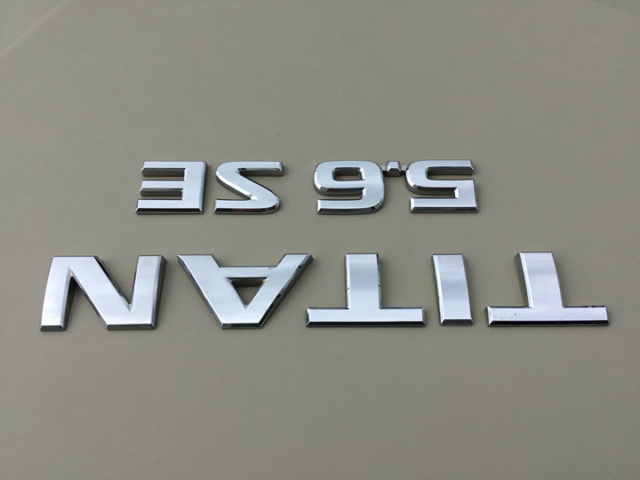 2004-2012 Nissan Titan 5.6 SE Tailgate Emblem Set