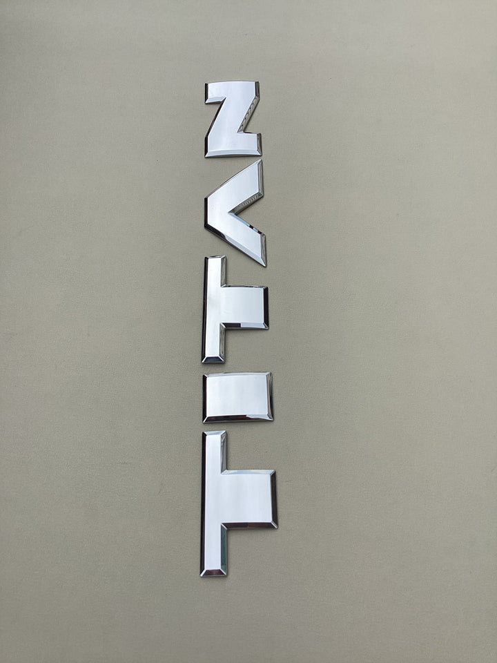 2016-2024 Nissan Titan Door Emblem