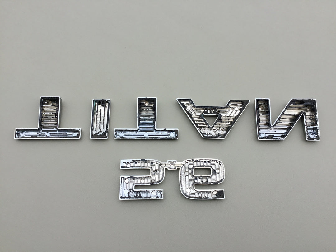 2004-2015 Nissan Titan 5.6 Tailgate Emblem Set