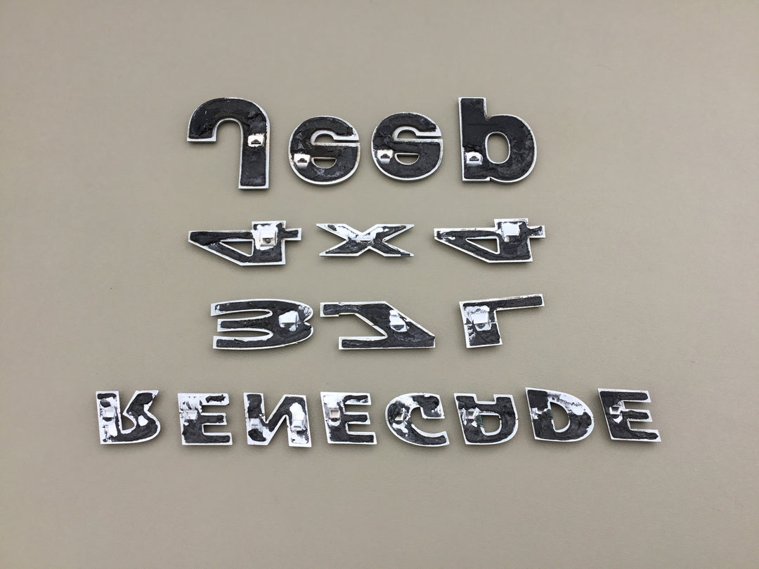 Jeep Liberty 4X4 3.7L Renegade Tailgate Emblem Set