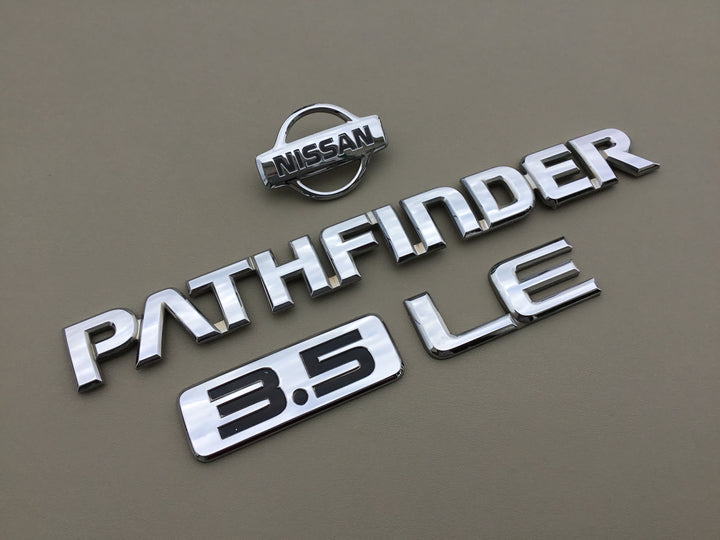 1999-2001 Nissan Pathfinder LE 3.5 Tailgate Emblem Set