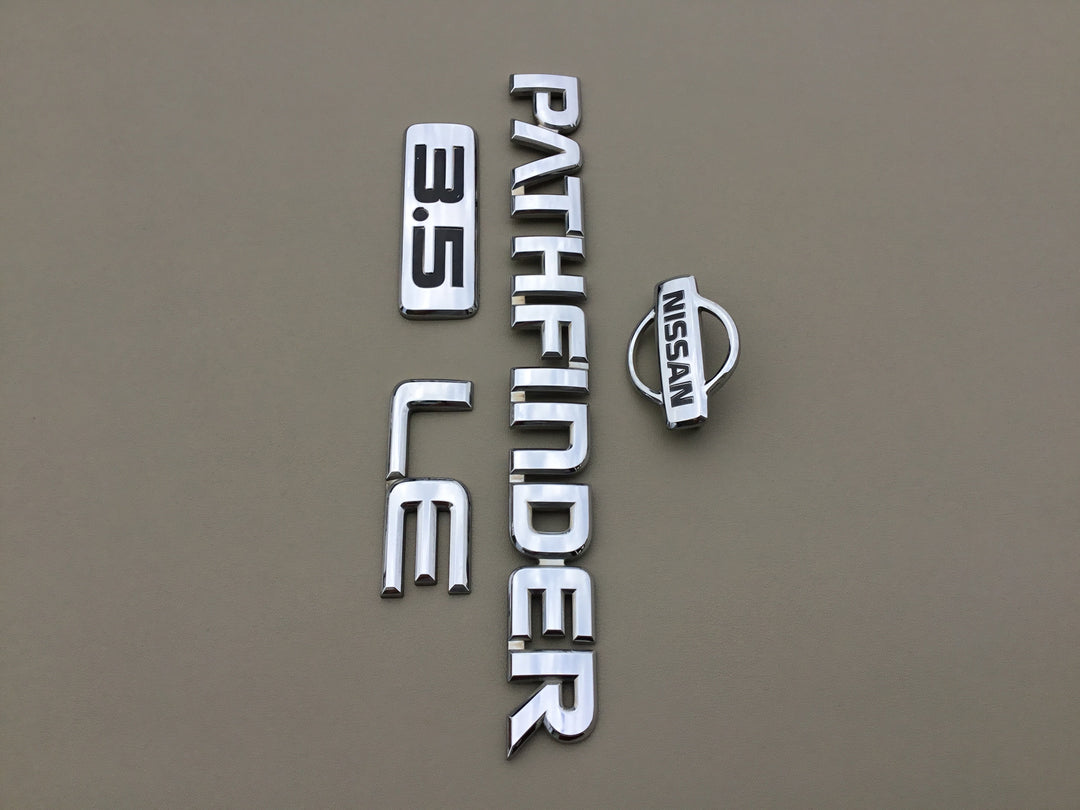 1999-2001 Nissan Pathfinder LE 3.5 Tailgate Emblem Set