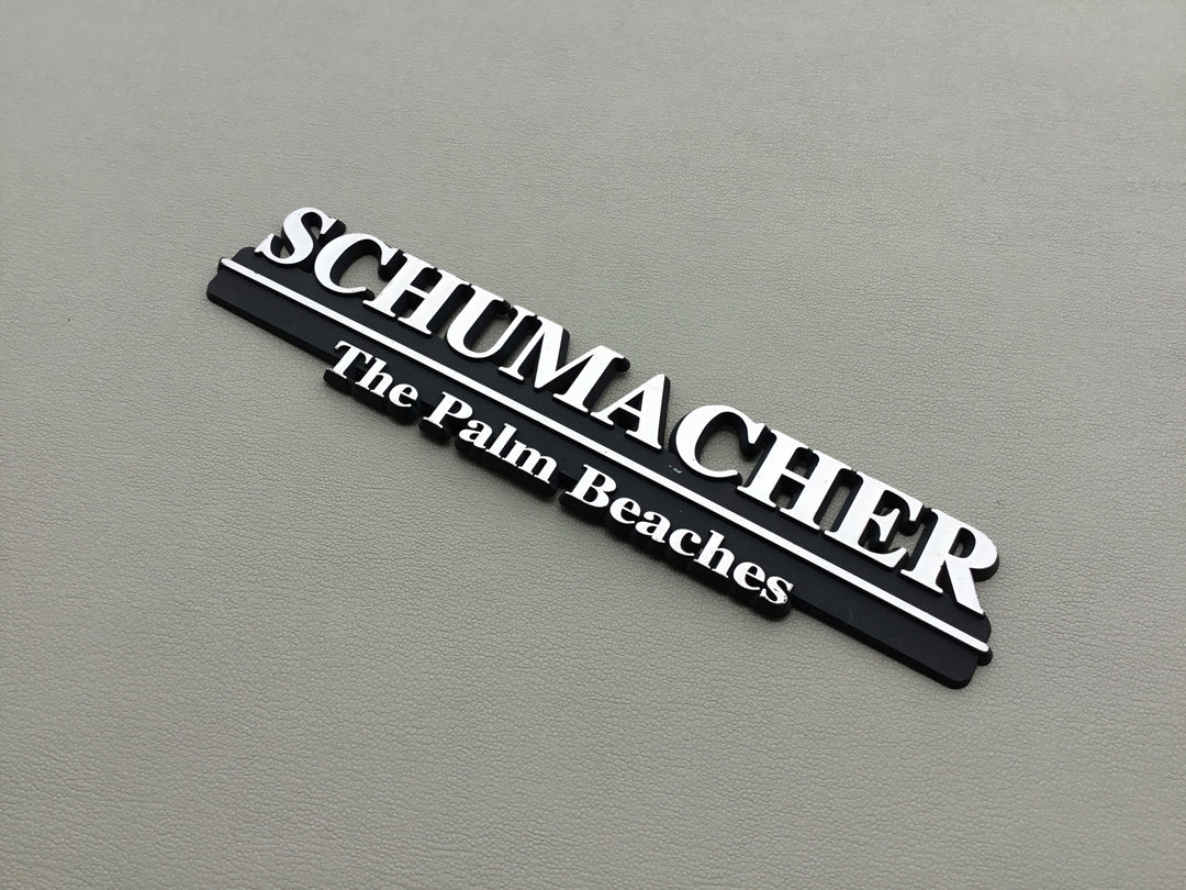 Schumacher The Palm Beaches Auto Dealership Emblem