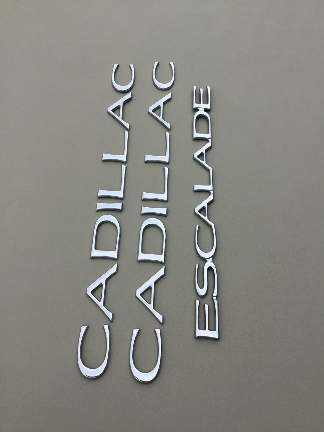 1999-2000 Cadillac Escalade Door & Tailgate Emblem Set