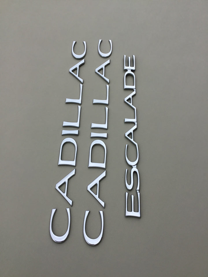 1999-2000 Cadillac Escalade Door & Tailgate Emblem Set