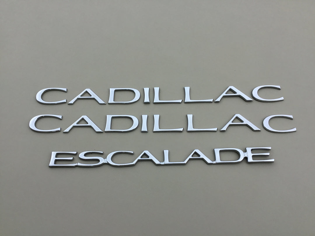 1999-2000 Cadillac Escalade Door & Tailgate Emblem Set