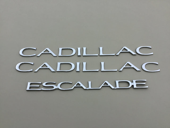 1999-2000 Cadillac Escalade Door & Tailgate Emblem Set