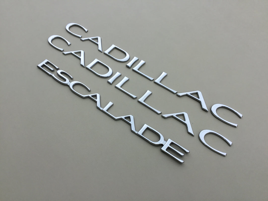 1999-2000 Cadillac Escalade Door & Tailgate Emblem Set