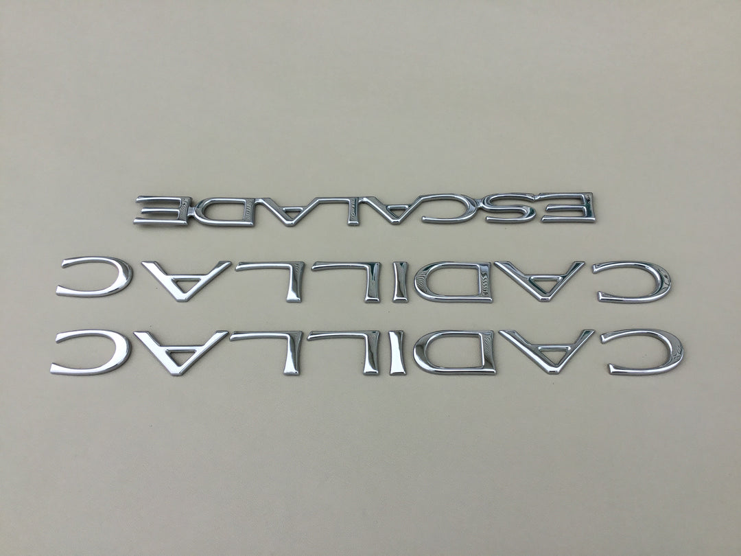 1999-2000 Cadillac Escalade Door & Tailgate Emblem Set