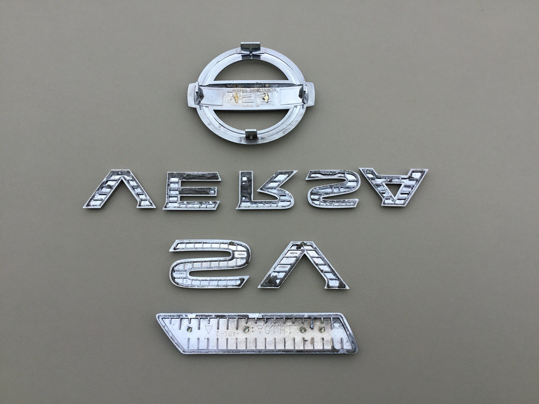 2012-2018 Nissan Versa SV Pure Drive Trunk Emblem Set