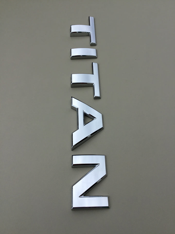 2004-2015 Nissan Titan Tailgate Emblem