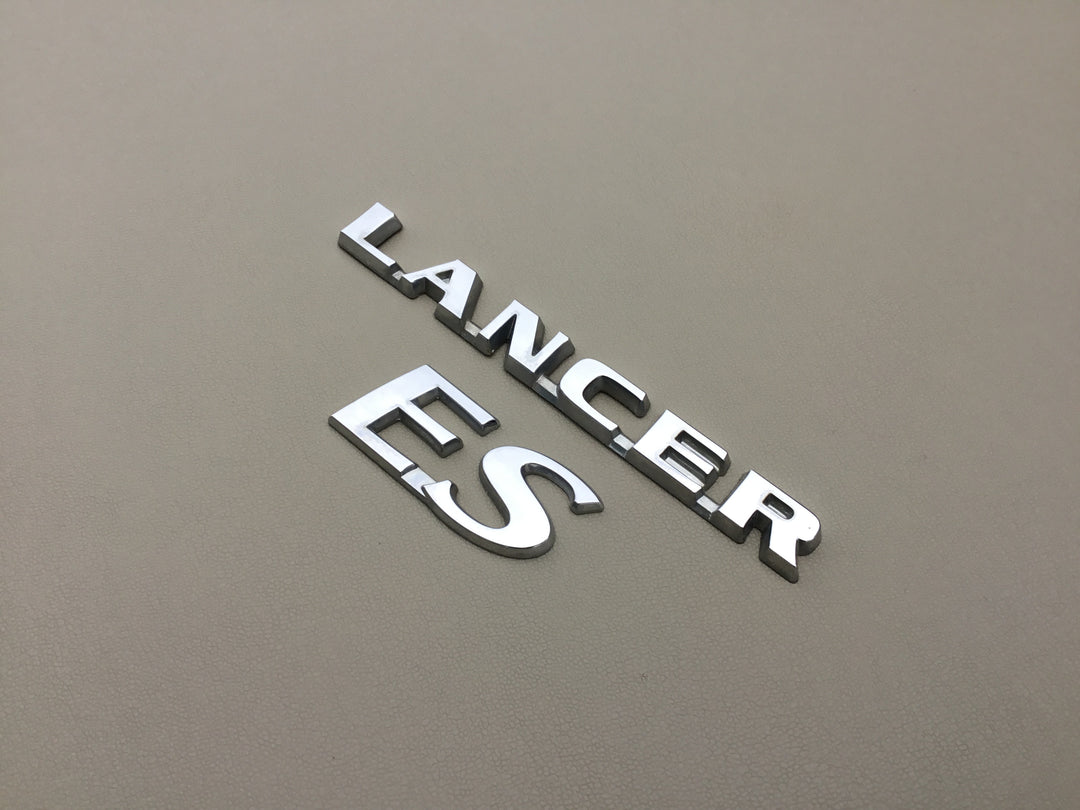 2004-2007 Mitsubishi Lancer ES Trunk Emblems