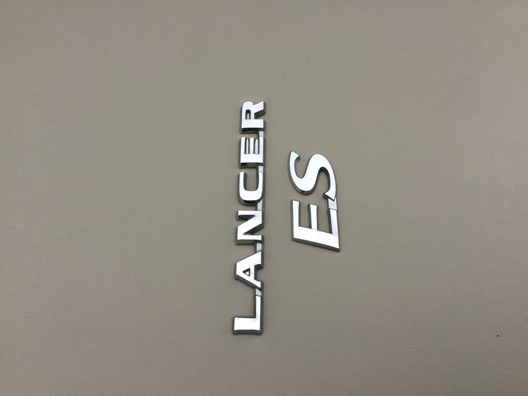 2004-2007 Mitsubishi Lancer ES Trunk Emblems