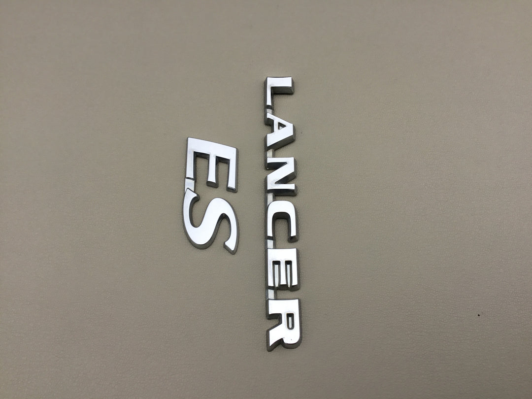 2004-2007 Mitsubishi Lancer ES Trunk Emblems