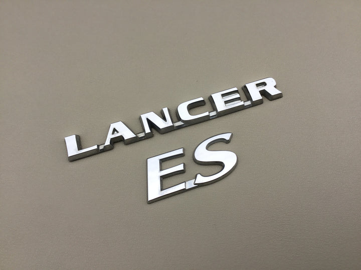 2004-2007 Mitsubishi Lancer ES Trunk Emblems