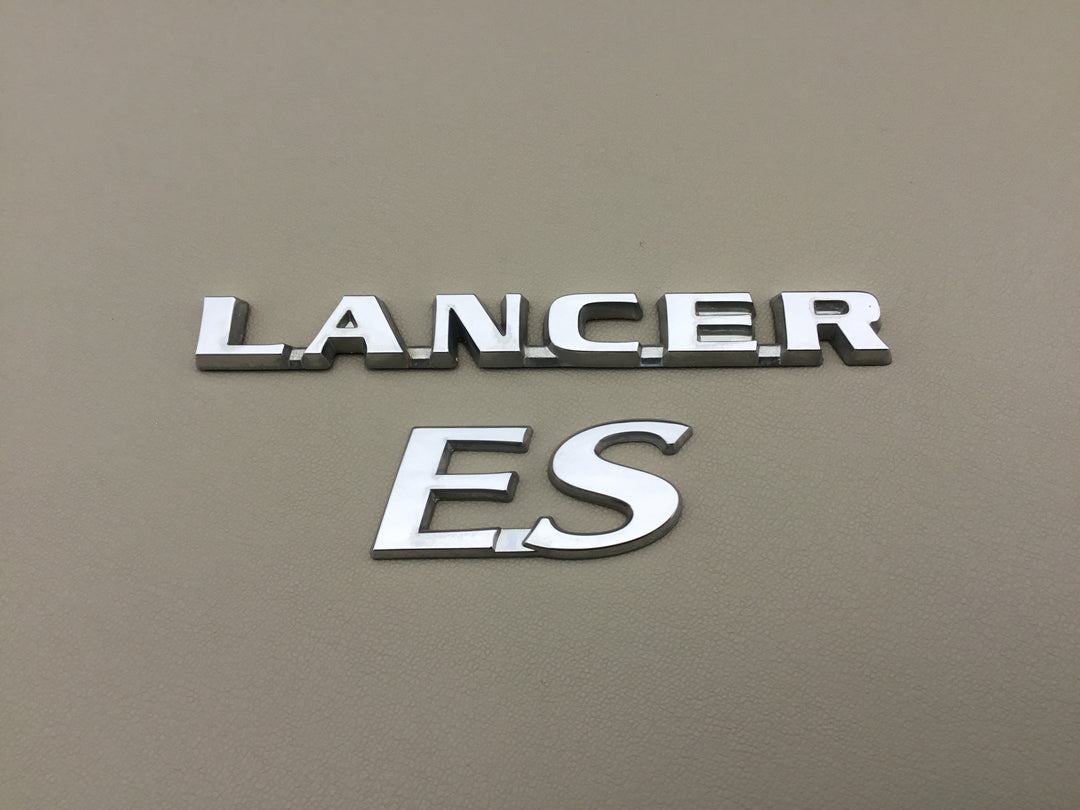 2004-2007 Mitsubishi Lancer ES Trunk Emblems