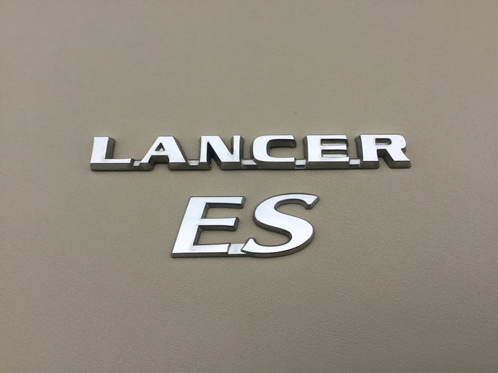 2004-2007 Mitsubishi Lancer ES Trunk Emblems