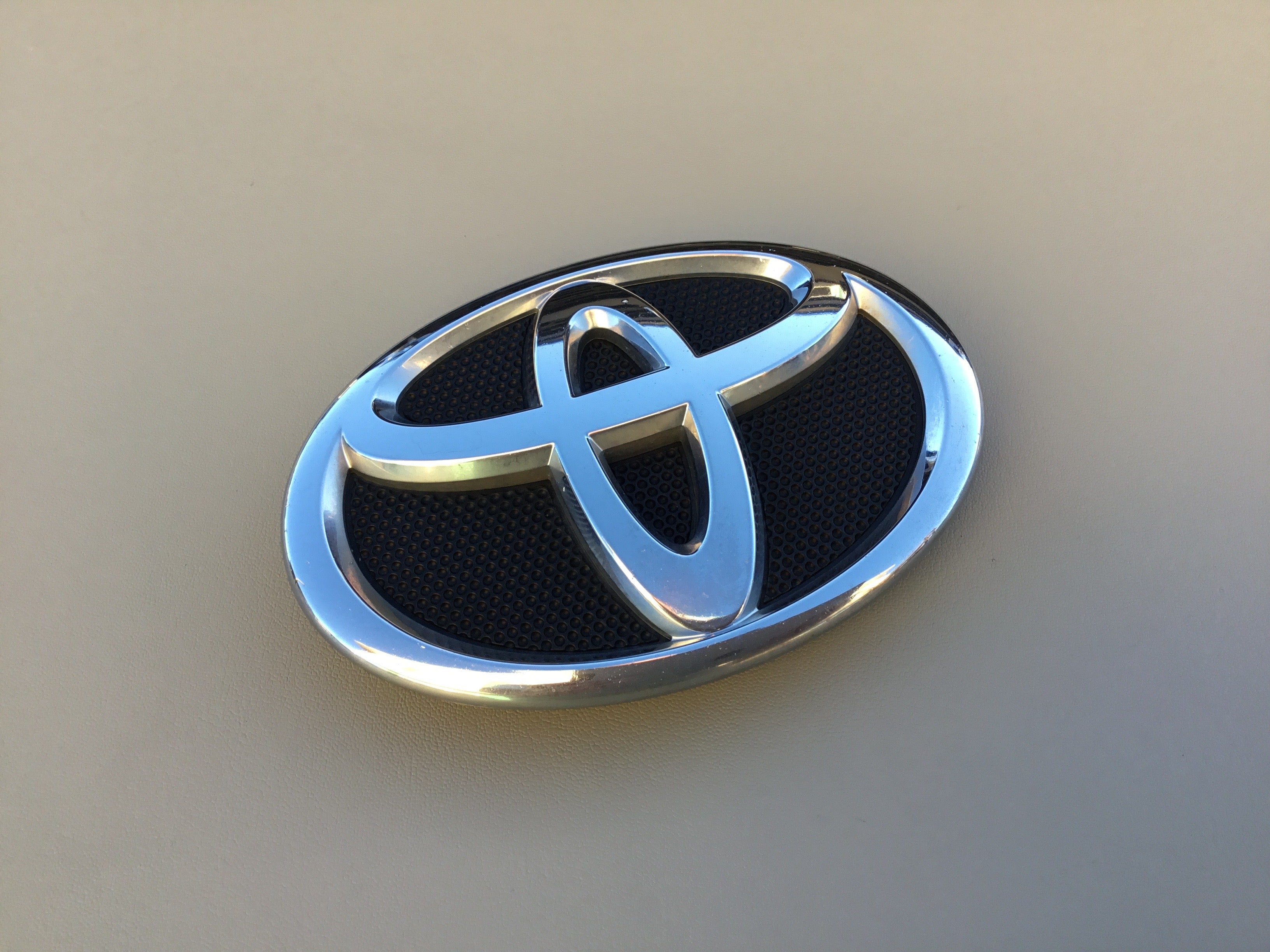 75311-02080 Genuine Toyota Radiator Grille Emblem(Or Front Panel