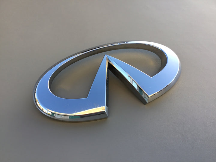 2004-2007 Infiniti QX56 Grille Emblem