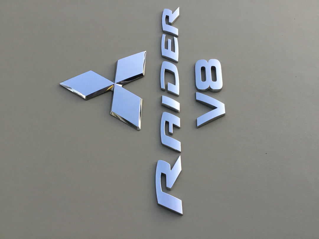 2006-2009 Mitsubishi Raider V8 Tailgate Emblem Set