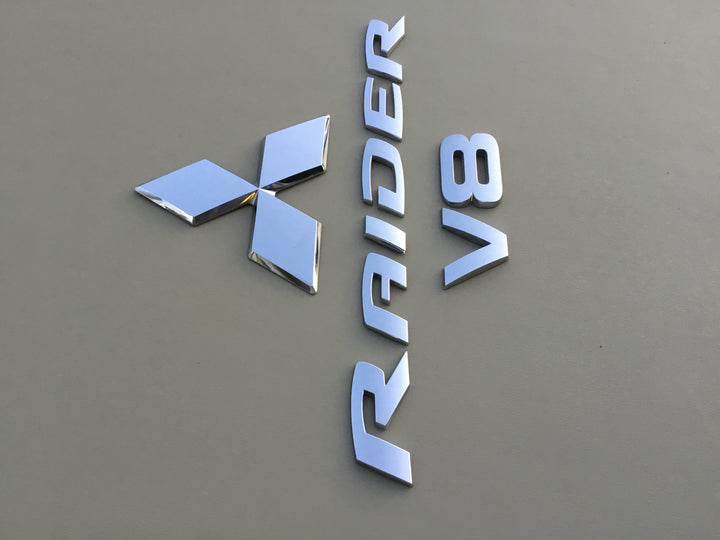 2006-2009 Mitsubishi Raider V8 Tailgate Emblem Set