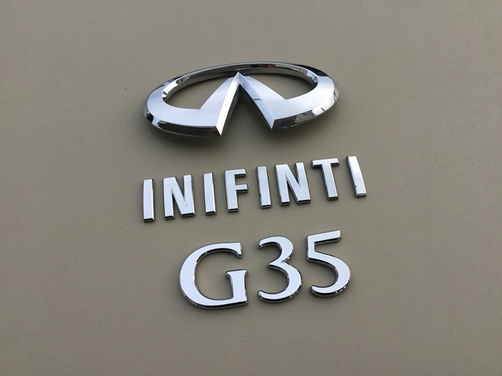 2003-2006 Infiniti G35 Trunk Emblem Set