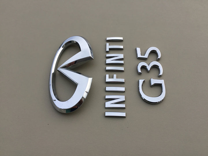 2003-2006 Infiniti G35 Trunk Emblem Set