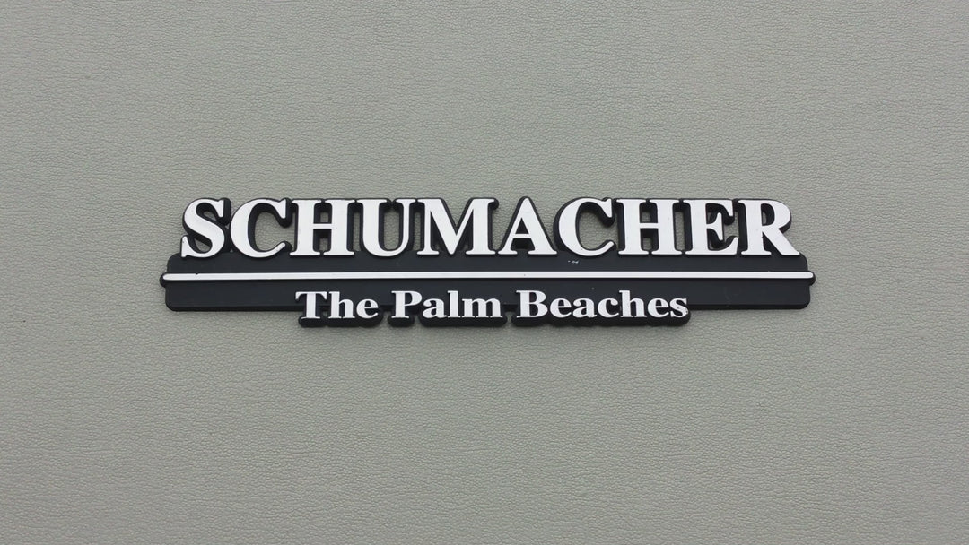 Schumacher The Palm Beaches Auto Dealership Emblem