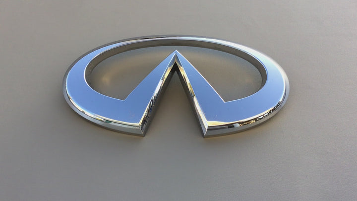 2004-2007 Infiniti QX56 Grille Emblem